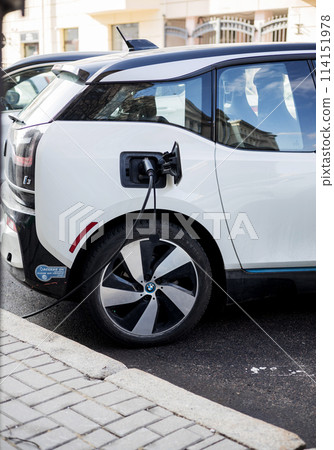 White BMW i3 Electric in parking slot White BMW i3 Electric in parking slot 114151978