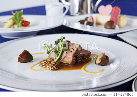 Main beef steak of the French course, fashionable presentation stock image Main beef steak of the French course, fashionable presentation stock image 114154805