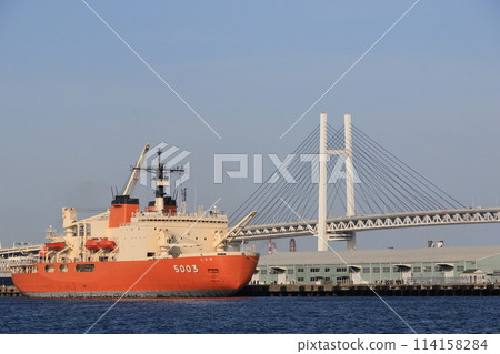 The Antarctic research vessel Shirase is anchored with the Bay Bridge in the background. 114158284
