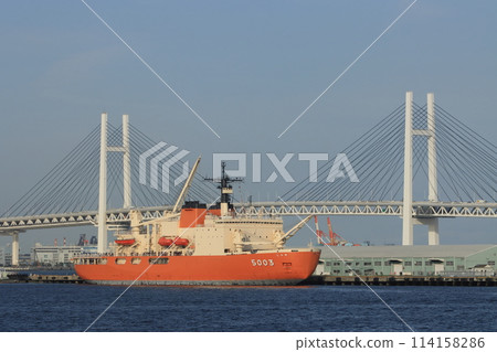 The Antarctic research vessel Shirase is anchored with the Bay Bridge in the background. 114158286