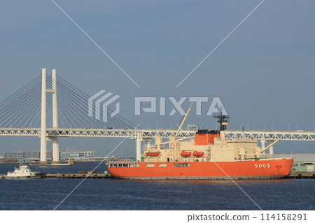 The Antarctic research vessel Shirase is anchored with the Bay Bridge in the background. The Antarctic research vessel Shirase is anchored with the Bay Bridge in the background. 114158291