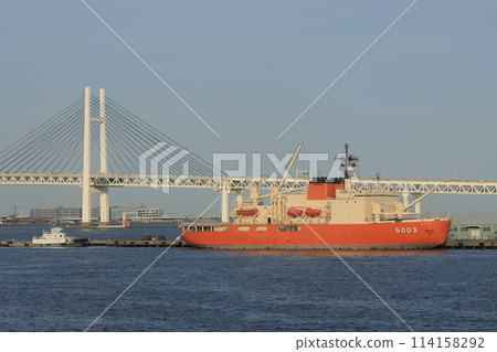 The Antarctic research vessel Shirase is anchored with the Bay Bridge in the background. 114158292