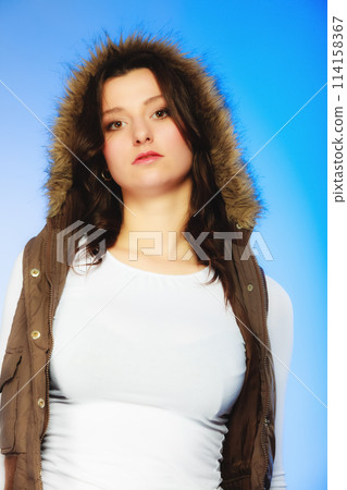 Woman in casual waistcoat. Winter fashion. Woman in casual waistcoat. Winter fashion. 114158367