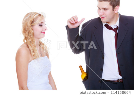 Bride having argument with drunk alcoholic groom Bride having argument with drunk alcoholic groom 114158664