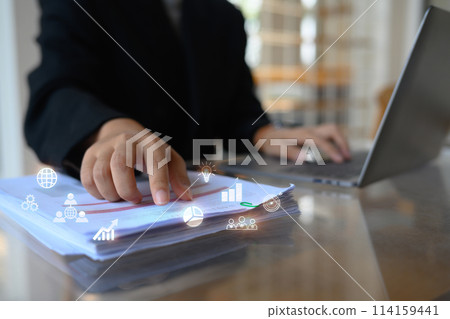 Businesswoman standing with creative online creative business interface 114159441