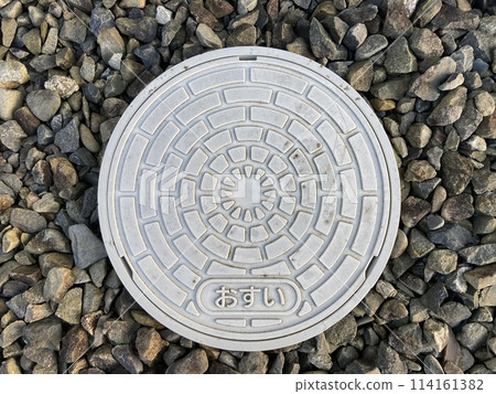 Sewage cover in the garden of the house Sewage cover in the garden of the house 114161382