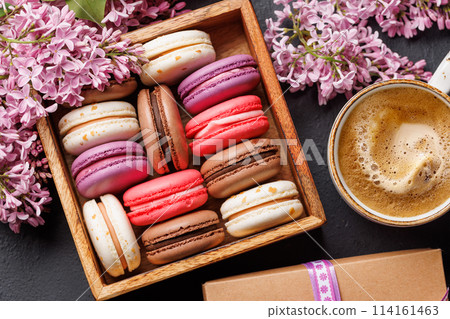 Colorful macaroons, arranged in a delightful display of vibrant hues Colorful macaroons, arranged in a delightful display of vibrant hues 114161463