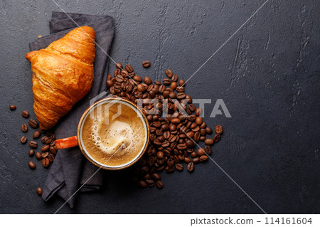 Cappuccino coffee and fresh croissant 114161604