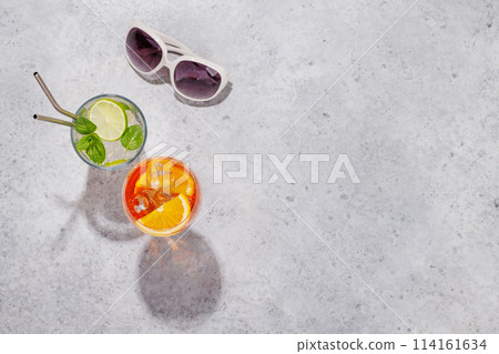 Refreshing cocktails by the pool on a sunny day Refreshing cocktails by the pool on a sunny day 114161634