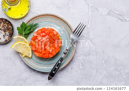 Delicious salmon and avocado tartare Delicious salmon and avocado tartare 114161677
