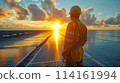close up Solar power station, Engineer maintaining solar cell panels on the rooftop, Engineer worker install solar panel. Clean energy concept. 114161994