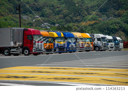 Trailer truck parked in a parking lot 114163213