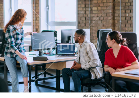 A diverse group of young business individuals congregates in a modern startup coworking center, embodying collaborative innovation and a dynamic atmosphere A diverse group of young business individuals congregates in a modern startup coworking center, embodying collaborative innovation and a dynamic atmosphere 114165178