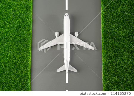 Airplane on the runway. Travel destinations. Air transport industry. Transportation and logistics. Search for cheap tickets. Destination hit on holidays. 114165270