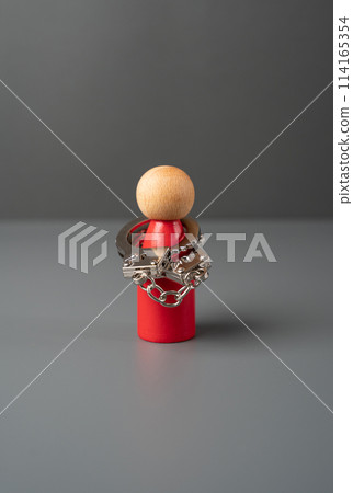 Man figurine in handcuffs. Mental health. Limitations and psychological problems. Stiffness and tightness. Find self-confidence. Throw off the shackles, liberate yourself. Remove fears and prejudices Man figurine in handcuffs. Mental health. Limitations and psychological problems. Stiffness and tightness. Find self-confidence. Throw off the shackles, liberate yourself. Remove fears and prejudices 114165354
