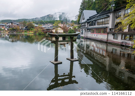 Ancient Torii gate at Kinrin Lake, Yufuin, Oita, Kyushu 114166112