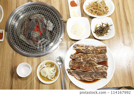 Korean style bbq. Marinated beef ribs 114167992