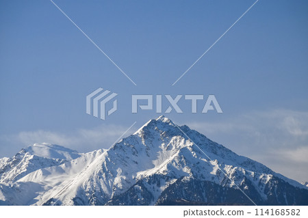 Snow covered mountains, Tian Shan, large system of mountain ranges in Central Asia Snow covered mountains, Tian Shan, large system of mountain ranges in Central Asia 114168582