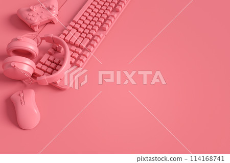 Modern home office setup featuring keyboard, gaming controllers and headphones 114168741