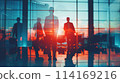 Silhouettes of business people walking in airport terminal.  114169216
