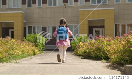 child kid girl daughter running school backpack, returning from school from lessons, children education school yard house running leg, sunny childhood play, preschooler at play, joyful run outside child kid girl daughter running school backpack, returning from school from lessons, children education school yard house running leg, sunny childhood play, preschooler at play, joyful run outside 114171343
