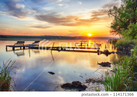 Amazing Dramatic sunset over the lake. 114171366