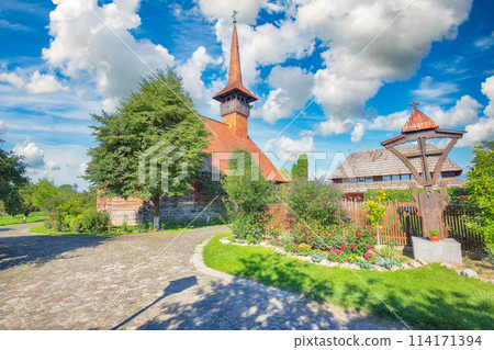 Amazing  summer scene of Iulia Alba town and Old wooden Michael the Brave church 114171394