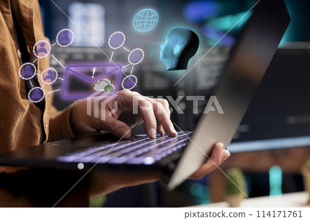 Person typing on laptop keyboard, sending information online, cloud connectivity concept, close up shot Technology user working with augmented reality to solve tasks Person typing on laptop keyboard, sending information online, cloud connectivity concept, close up shot Technology user working with augmented reality to solve tasks 114171761