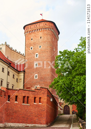 The old red brick Zamek Krolewski na Wawelu castle in the center of Krakow. The old red brick Zamek Krolewski na Wawelu castle in the center of Krakow. 114171813