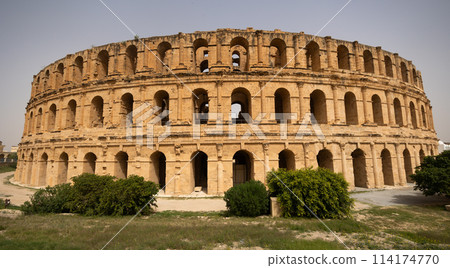 Impressive ruins of the largest colosseum in North Africa, huge Roman amphitheater in small village of El Jem, Tunisia Impressive ruins of the largest colosseum in North Africa, huge Roman amphitheater in small village of El Jem, Tunisia 114174770