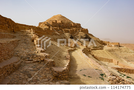 Ancient abandoned Berber dwellings of Ksar Guermassa, Tunisia Ancient abandoned Berber dwellings of Ksar Guermassa, Tunisia 114174775