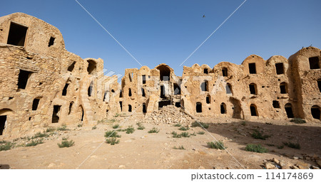 Ancient stone ruins in town of Tatouine. Ksar Mgabla closest Ksar to Tataouine, Tunisia Ancient stone ruins in town of Tatouine. Ksar Mgabla closest Ksar to Tataouine, Tunisia 114174869