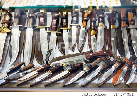 Knives collection in Toledo's souvenir shop Knives collection in Toledo's souvenir shop 114174891