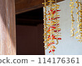 Chili peppers dried on the veranda 114176361