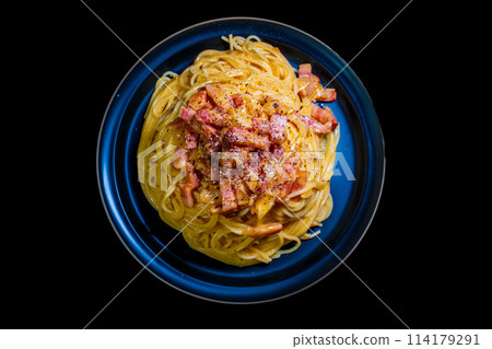 Carbonara pasta with bacon and pepper, top view 114179291