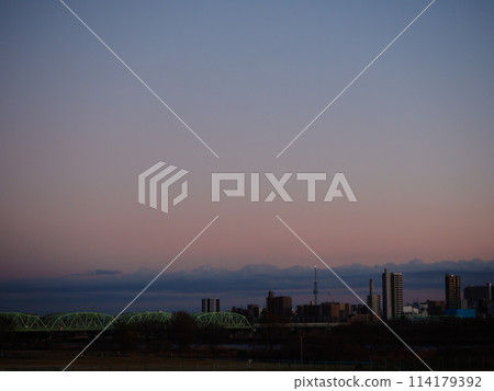 Beautiful evening view of Tokyo from the Arakawa River bank in Kawaguchi city Beautiful evening view of Tokyo from the Arakawa River bank in Kawaguchi city 114179392