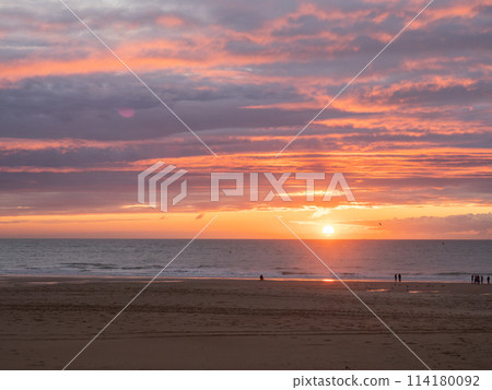 Oostende, Belgium - July 31st 2023: View over the city beach during sunset. 114180092