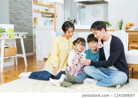 Friends family seeing smartphone 114180697