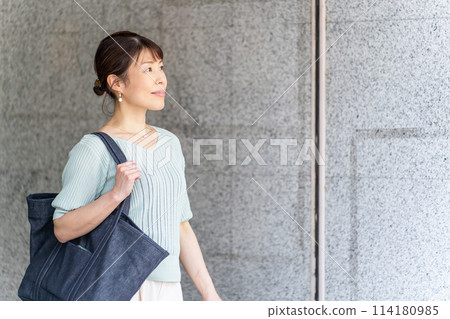 Businesswoman, Asian woman commuting from apartment 114180985