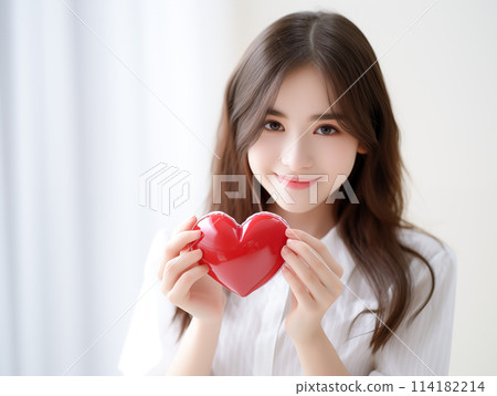 A smiling woman with a heart 114182214