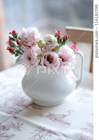 Flowers in a pitcher 114182399