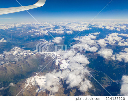 Snow-covered mountain range seen from an airplane, over Stelvio National Park, South Tyrol, Italy Snow-covered mountain range seen from an airplane, over Stelvio National Park, South Tyrol, Italy 114182620