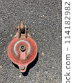 Rusty shackle pulley 114182982