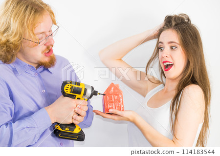 Couple thinking about house renovation Couple thinking about house renovation 114183544