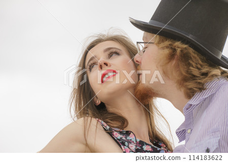 Vintage couple against sky 114183622