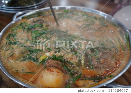 Korean traditional food. Pork Back-bone Stew is a thick traditional Korean food made with pork spine, potatoes, and various vegetables. 114184027