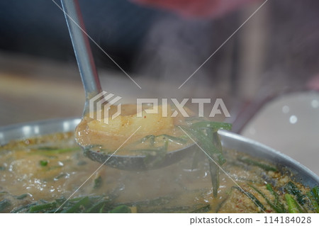 Korean traditional food. Pork Back-bone Stew is a thick traditional Korean food made with pork spine, potatoes, and various vegetables. 114184028