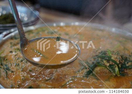Korean traditional food. Pork Back-bone Stew is a thick traditional Korean food made with pork spine, potatoes, and various vegetables. 114184030