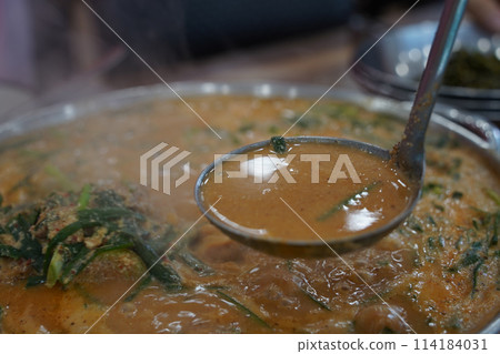Korean traditional food. Pork Back-bone Stew is a thick traditional Korean food made with pork spine, potatoes, and various vegetables. 114184031