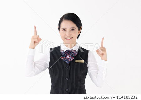 Middle-aged woman in uniform pointing 114185232